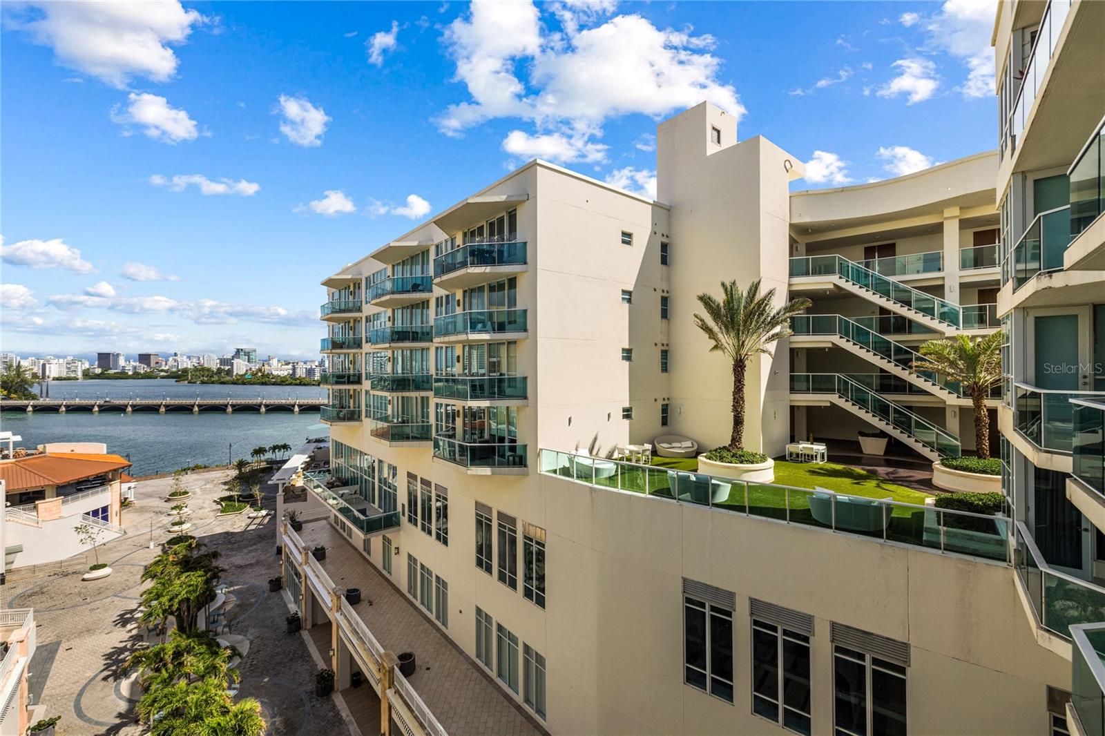 Best Price in Bahia Plaza! Experience resort-style living in one of San Juan’s most sought-after communities in San Juan - Bahia Plaza at Paseo Caribe.
This well-appointed 2-bedroom, 2.5-bathroom residence offers 1,910 sq ft of interior space, combining comfort, functionality, and style. The open-concept living and dining area is exceptionally spacious, ideal for entertaining or relaxing. The kitchen features generous counter space and a layout that flows seamlessly into the main living area.
The primary bedroom includes a large en suite bathroom and a spacious walk-in closet. The second bedroom also features its own en suite bath, providing privacy and flexibility for guests or additional household members.
Offered fully furnished, this residence is priced competitively — currently the best value in Bahia Plaza. It is well-suited as a primary residence, a second home, or an investment property with strong rental appeal.
Bahia Plaza offers 24/7 concierge service, a full backup generator, water cistern, swimming pool, fitness center, and more. Ideally located between Condado and Old San Juan, residents enjoy easy access to beaches, restaurants, shops, and cultural attractions.