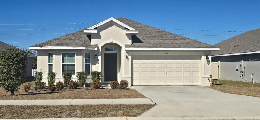 Prime location close to highways 27 and 17. This open-concept home offers 3 bedrooms and 2 bathrooms, with a fully fenced backyard and a covered rear porch. Features include stainless steel appliances, tile flooring, and carpeted bedrooms. Situated on a high and dry lot, this home is vacant, move-in ready, and waiting for you.