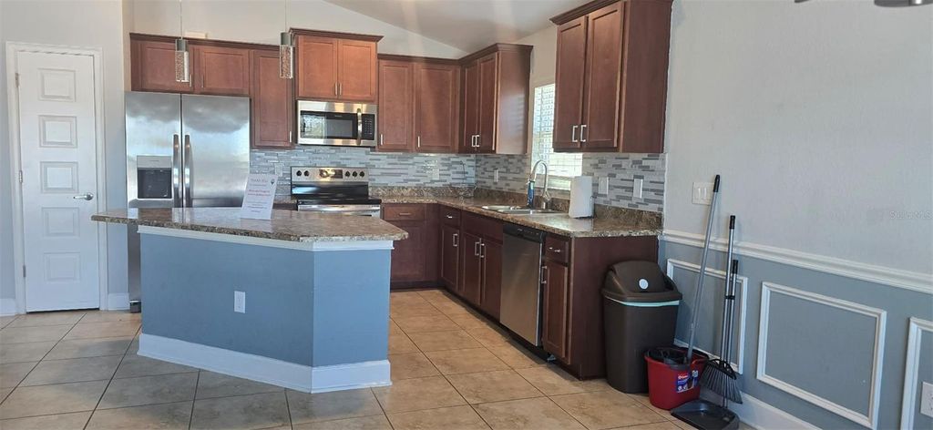 Photo of 1061 Citrus Landings Boulevard, Davenport, FL 33837 (MLS # S5148339)