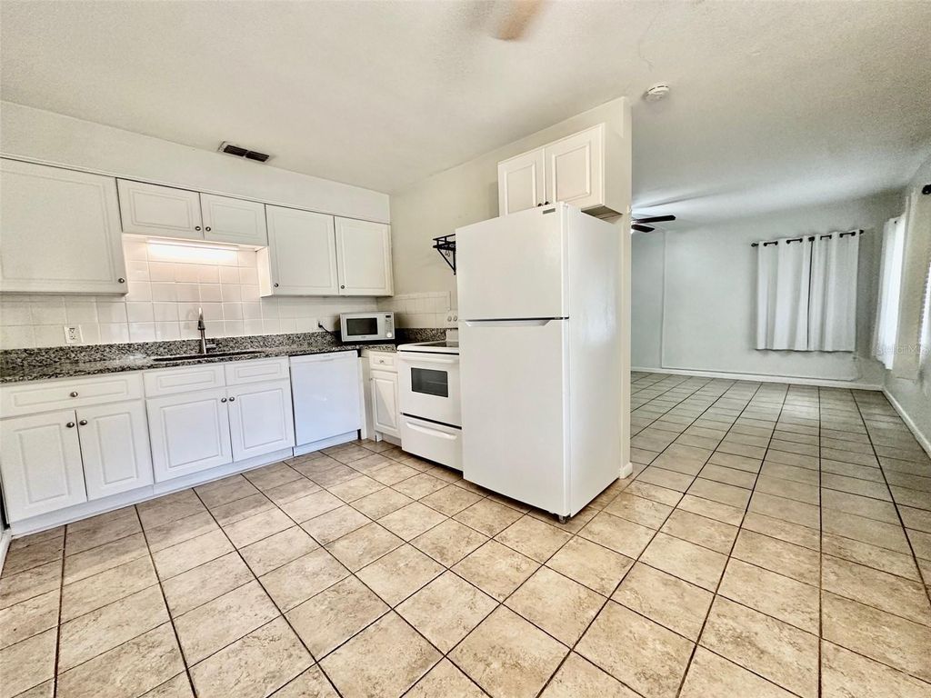 Photo of 1727 Douglas Avenue, Dunedin, FL 34698 (MLS # TB8434554)
