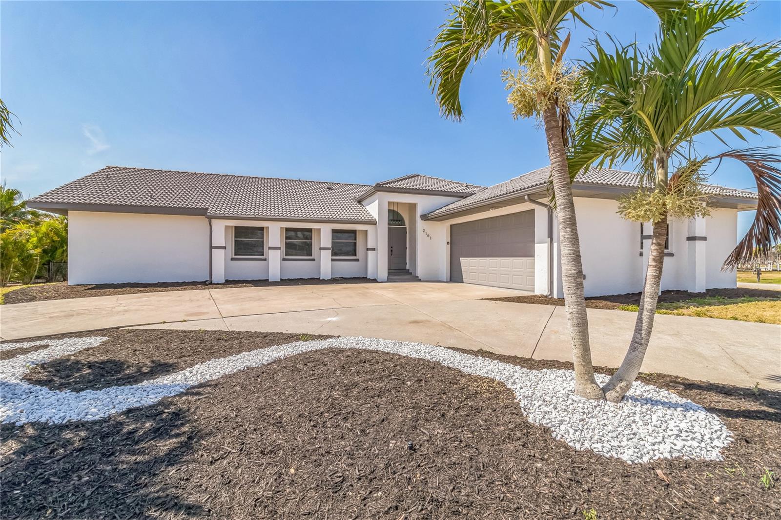 Turnkey waterfront rental offering a fully remodeled 3 bedroom, 2 bath, 2 car garage home in a highly desirable Punta Gorda location. Situated on a spacious waterfront lot, this home provides direct canal access to open water with a private dock, ideal for boating and enjoying the natural beauty of the area.
The outdoor living space includes a heated in-ground spa and an expansive screened lanai, designed for year-round relaxation and entertaining. Inside, the open floor plan features a large gourmet kitchen with an oversized island, real wood cabinetry, stainless steel appliances, and upgraded finishes throughout. Luxury flooring flows through the main living areas, and abundant windows provide natural light and water views.
This property has been thoughtfully updated throughout, offering modern conveniences in a tranquil waterfront setting. Conveniently located near shopping, dining, marinas, parks, and major roadways, providing easy access to all that the area has to offer. Immediate occupancy available with a straightforward application process.