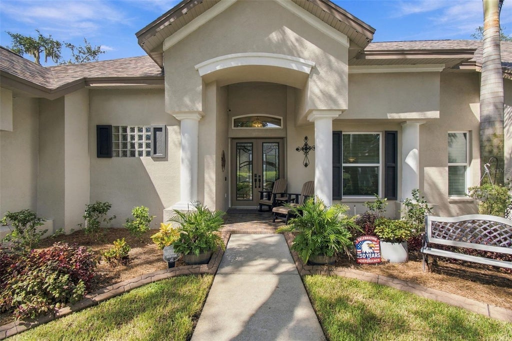 Photo of 5105 Sylvan Oaks Drive, Valrico, FL 33596 (MLS # TB8550093)