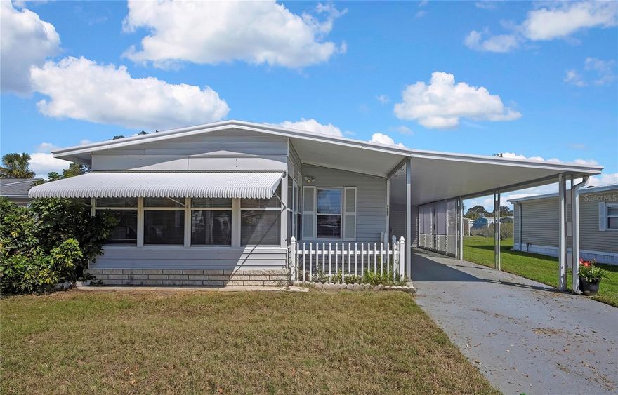 Stop and check out this well-maintained home in a very active 55+ community. Home is furnished with 2 bedrooms, 2 bathrooms, finished Florida room with separate a/c. Central heat and air-conditioning NEW in 2022, NEW Refrigerator, NEW dryer, enclosed and screen lanai. Windows have been replaced; seller is not sure of year of replacement. Low monthly maintenance fee of $143.00 includes lawn service, garbage removal, maintenance of year-around-heated pool, Clubhouse, Shuffleboard and the common areas. You OWN YOUR LAND.

Measurements are approx. Buyer to verify all information that is deemed to be accurate.