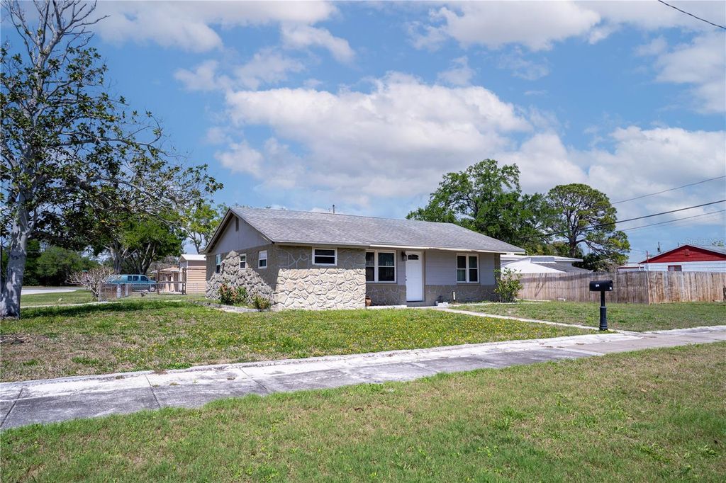 Photo of 701 61st Avenue NE, St Petersburg, FL 33703 (MLS # TB8493060)