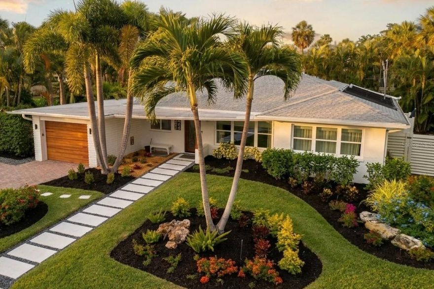What if you could own a fully renovated beach house on St. Armands Circle for the price many buyers are paying for an outdated condo… while being surrounded by $3M-$10M homes just blocks from the Gulf? Welcome to 409 N Washington Drive, an exceptionally rare opportunity to own one of the least expensive fully renovated homes to become available on St. Armands in years. Perfectly positioned just two blocks from the world-famous boutiques, restaurants, and cafés of St. Armands Circle, and only three blocks from the beautiful beaches of Lido Key, this charming single-story bungalow captures the kind of lifestyle most only experience on vacation. And here, vacation never has to end. Tucked away on one of the quietest streets on the Key, this beautifully updated 2-bed, 2-bath residence spans about 1700 SF and has been thoughtfully designed to deliver effortless coastal living with a resort-style feel. Lush tropical landscaping creates a sense of privacy rarely found this close to the beach and Circle, while multiple outdoor patios, lounging areas, and a sparkling resort-style pool invite year-round indoor-outdoor living and entertaining. Behind the charming exterior is a completely updated residence designed for effortless ownership, low-maintenance living, and maximum enjoyment. The home has undergone extensive renovations including updated PVC plumbing, updated electrical systems, hurricane-rated impact windows and doors, renovated kitchen and bathrooms, upgraded flooring, modern finishes, updated appliances, and refreshed indoor-outdoor living spaces. Every detail was intentionally curated to create a bright, inviting atmosphere that feels relaxed, elevated, and move-in ready from day one. Unlike many older island properties that become renovation projects disguised as opportunities, 409 N Washington removes the uncertainty, expense, and disruption buyers often fear when purchasing near the coast. There is no looming “what will break next?” anxiety here. The heavy lifting has already been done. For investors, this property checks nearly every box that drives premium short-term rental performance: an iconic walkable location, proximity to the beach, strong luxury rental demand, a fully furnished turnkey setup, and a proven St. Armands address that has historically outperformed many Sarasota County markets in appreciation and desirability. Offered furnished, including household goods, linens, décor, and months of future bookings in place, this is the type of property capable of generating strong occupancy with minimal downtime while also serving as a long-term appreciation play in one of Florida’s most supply-constrained markets. For lifestyle buyers, the appeal becomes even more personal. Imagine morning walks to coffee on the Circle, afternoons at Lido Beach, sunset dinners without needing a car, and evenings entertaining poolside after a day on the water. Whether used as a seasonal retreat, a lock-and-leave second home, or a full-time residence for a buyer seeking a lower-maintenance alternative to condominium living, this home delivers the rare combination of freedom, convenience, privacy, and coastal charm. In an area where many properties require extensive updating or command significantly higher prices, this home represents a rare opportunity to own a turnkey St. Armands residence with lifestyle appeal, income potential, and long-term investment strength wrapped into one exceptionally charming property.
