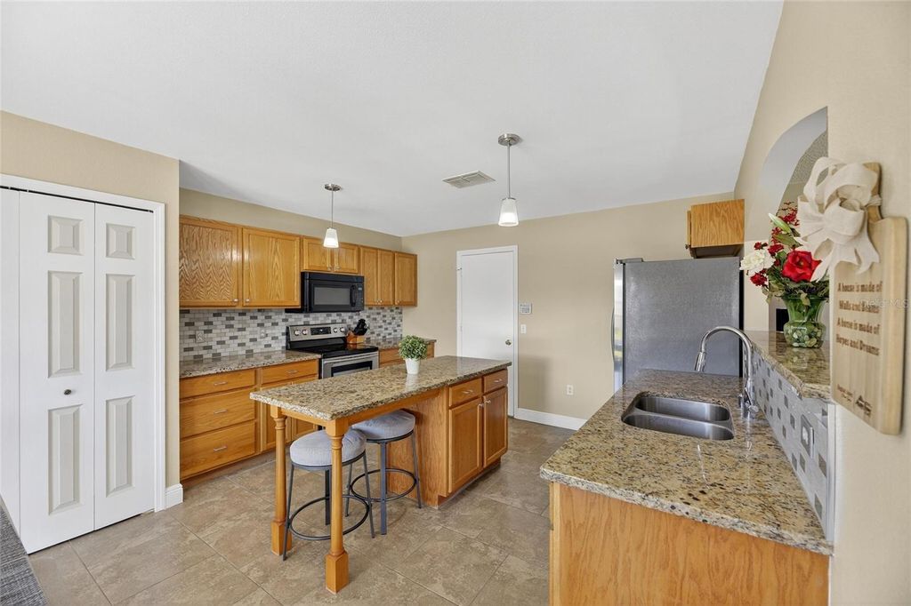 Photo of 6510 Tabogi Trail, Wesley Chapel, FL 33545 (MLS # TB8422528)