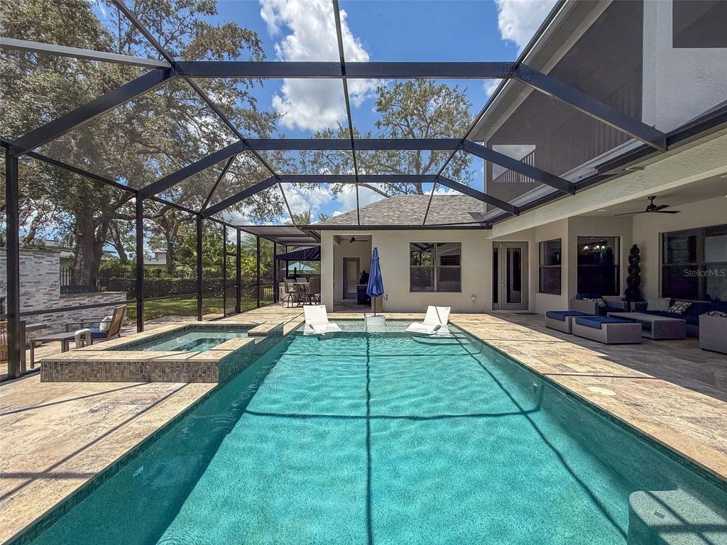 Photo of 9808 Milano Drive, Trinity, FL 34655 (MLS # TB8400760)