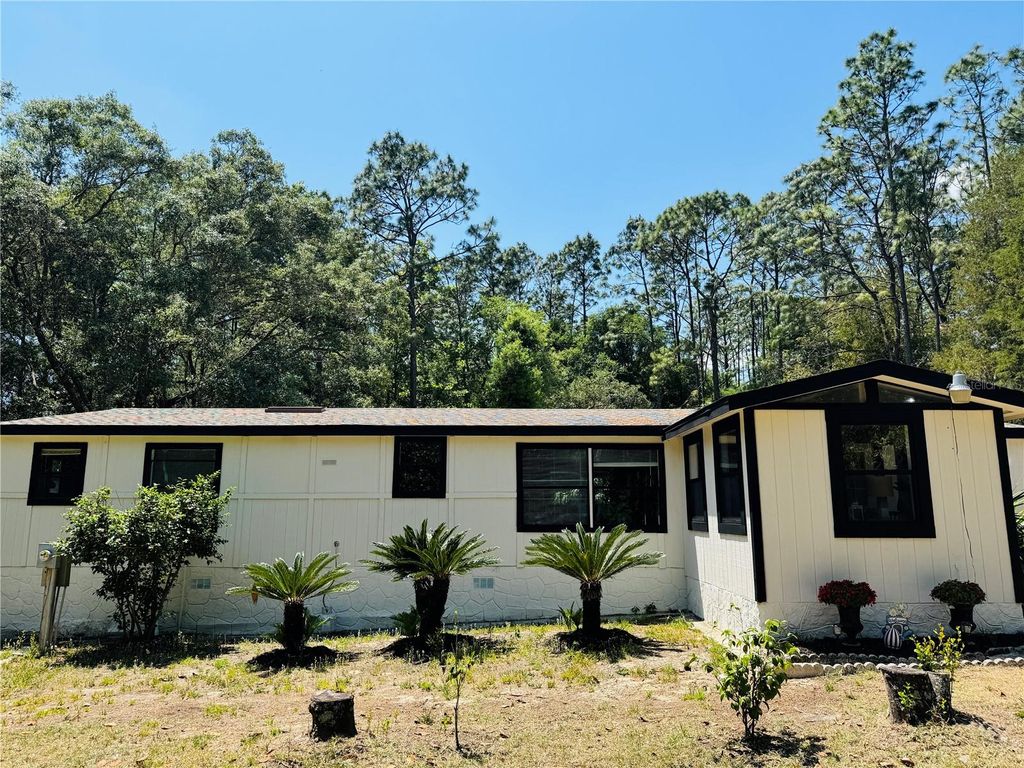 Photo of 5560 SW 183rd Terrace, Dunnellon, FL 34432 (MLS # OM700384)