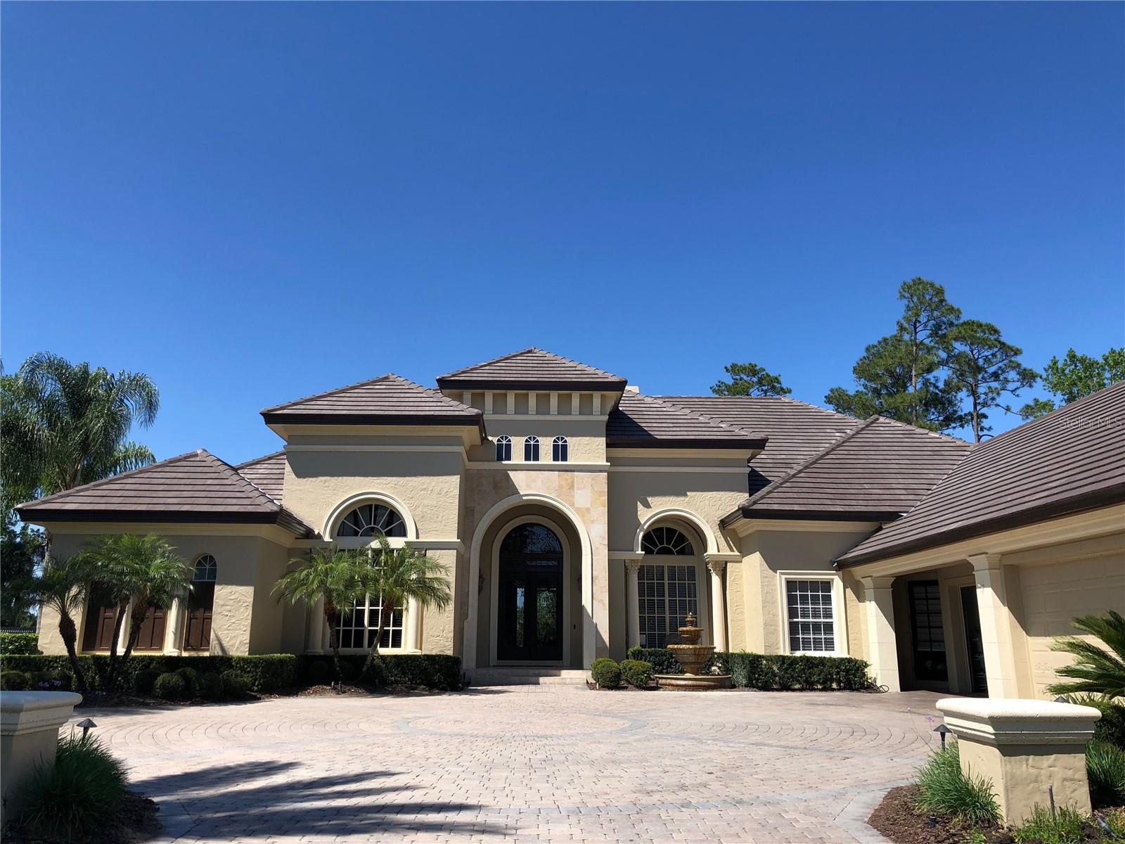 Luxury executive home in private Enclave in Alaqua Lakes. Dave Brewer custom built award-winning floorplan. Located on the third hole at Legacy Golf Course. Every detail has been completed for you; complete interior renovation/remodel, newer roof, new HVAC units (3). Gourmet kitchen complete with two islands, Wolfe range, tons of storage. Master closets are beyond amazing!