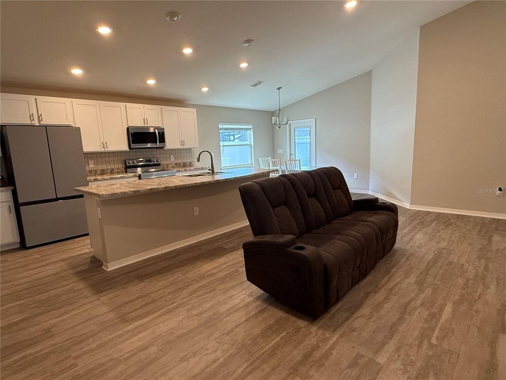 Photo of 1035 Tropea Lane, Auburndale, FL 33823 (MLS # S5142688)