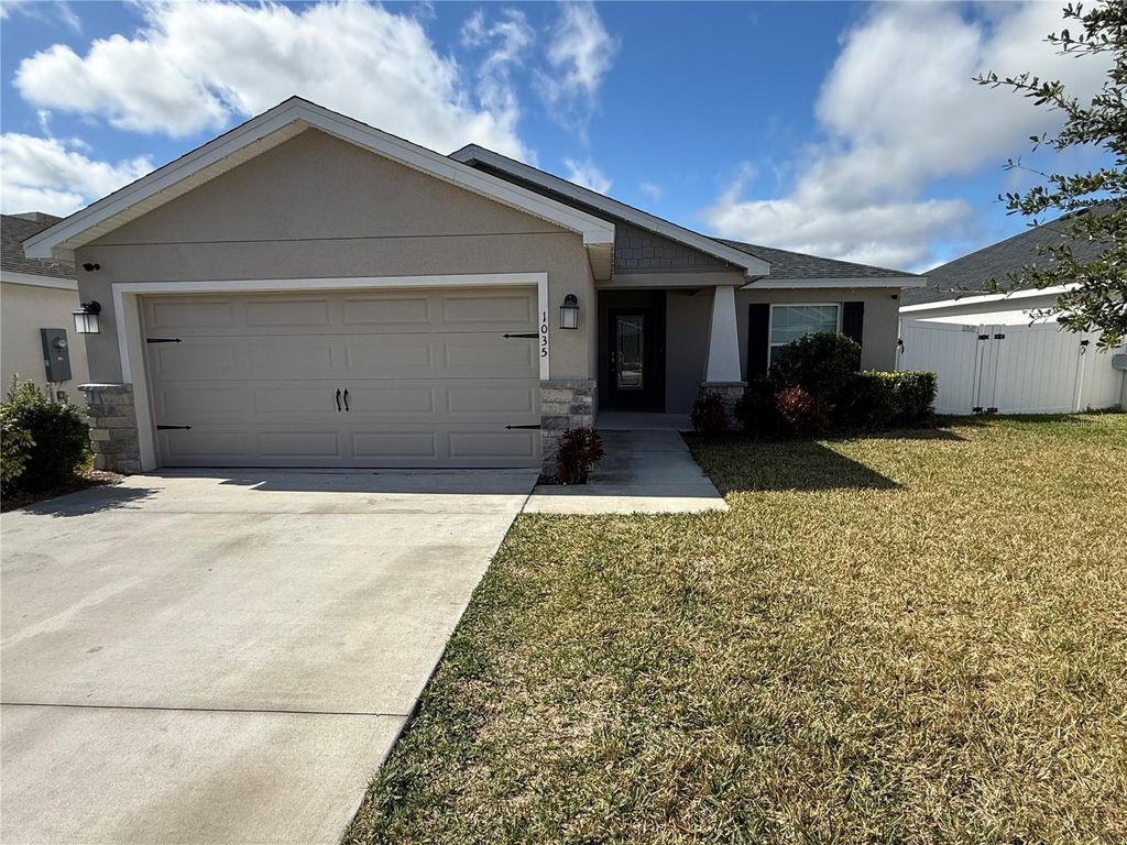 Photo of 1035 Tropea Lane, Auburndale, FL 33823 (MLS # S5142688)
