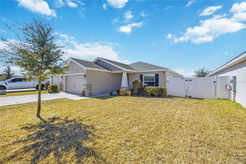 Photo of 1035 Tropea Lane, Auburndale, FL 33823 (MLS # S5142688)