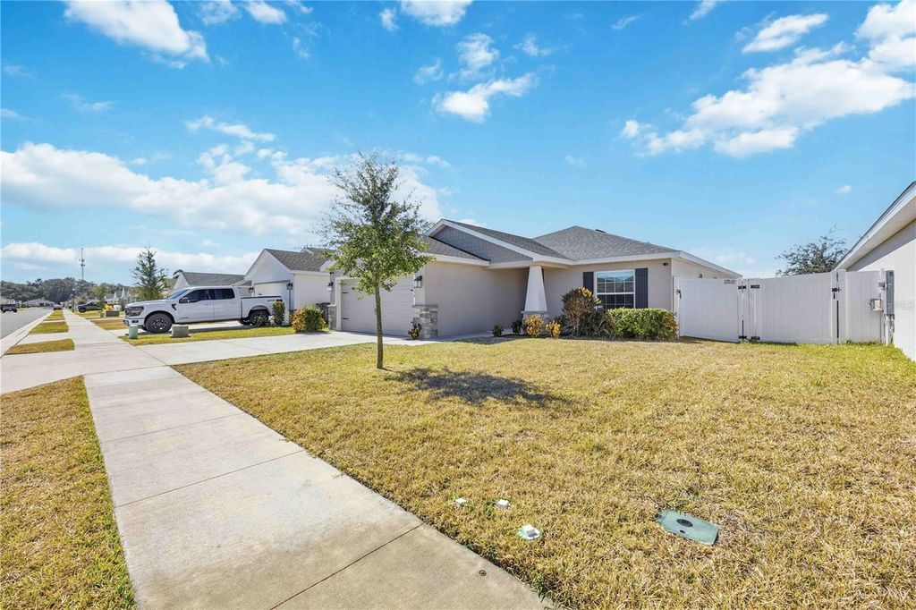 Photo of 1035 Tropea Lane, Auburndale, FL 33823 (MLS # S5142688)