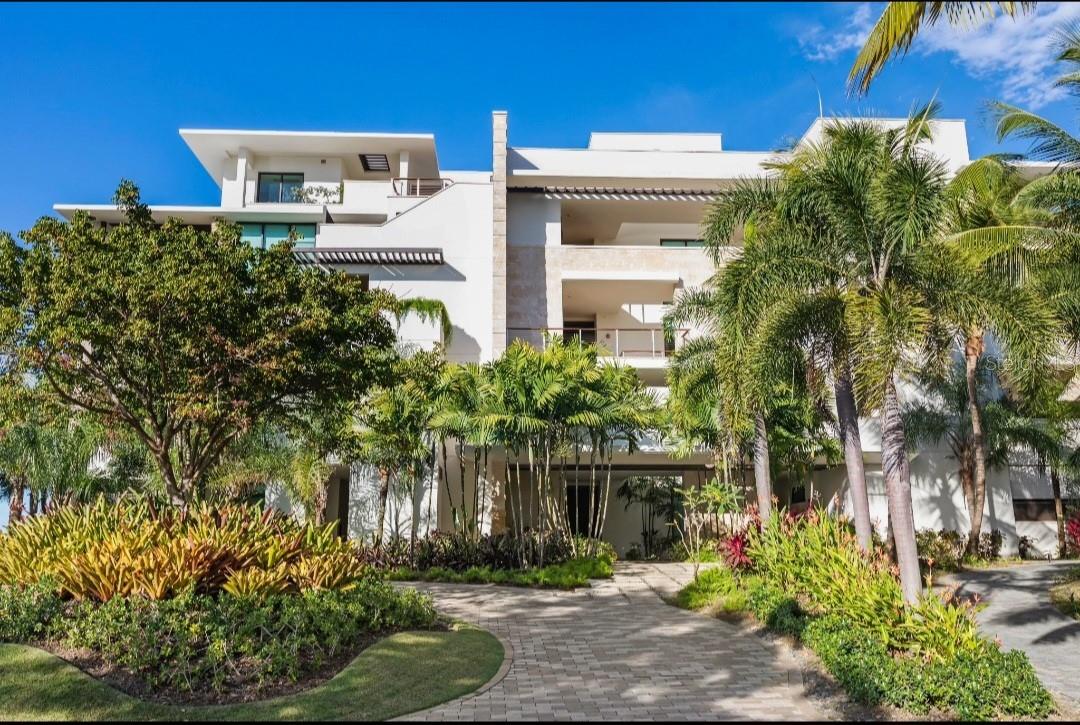 A serene waterfront luxury condo-apartment, enviably positioned in the Dorado Beach Resort, within the world renowned RITZ CARLTON RESERVE HOTEL, grounds where lush gardens, pristine beaches, well known TPA Golf courses, fine dining and Botanical Spa experiences (amongst others) awaits you for a magnificent and unique Resort-Lifestyle encounter. WEST BEACH enclave offers a luxurious and distinctive living experience within this spectacular beachfront condominium with breathtaking views of the ocean and surrounding nature trees and trails that will mesmerized you from this amazing 3,663 sq ft open open floor plan unit. This property combines luxury and comfort in an unparalleled manner. Featuring elegant designed open spaces exquisitely decorated and fully furnished. This condo beach apartment boasts three (3) ensuite bedrooms. Sunrise will never be the same as you wake up overlooking the transparent blue ocean from either of the two (2) master bedrooms, both with Spa style bathrooms that includes a free-standing bathtub and outdoor showers. The third room overlooks the lake and golf course. The spacious, chic and modern-style kitchen, with top-of-the-line appliances, seamlessly integrates into the property's opened and lighted grand room space. As part of this fabulous community, residents enjoy exclusive access to the amenities of Dorado Beach & Club, along with concierge services and all the comforts of the Ritz-Carlton Reserve, including pool, spas, fine dining restaurants, and various recreational facilities. Access to the Dorado Beach Resort Club requires membership. Located in a secure area with access to one of Puerto Rico's best beaches. WEST BEACH Condo Residences also features access to the affiliated members to a sports complex (HUB SPORTS) offering pickleball courts, soccer fields, beach tennis courts, volleball-basketball and racquet ball courts, among others. As a branded Ritz-Carlton Residences owner, a VIP status awarded, including some privileges and benefits. This magnificent property is ready for you to move in and experience an unforgettable beachfront experience. Immerse yourself in the ultimate beachfront lifestyle and embrace the convenience of easy access to the pristine shoreline allowing you to spend endless days basking in the sun. A golf cart is included. Contact us for a private and exclusive tour.
