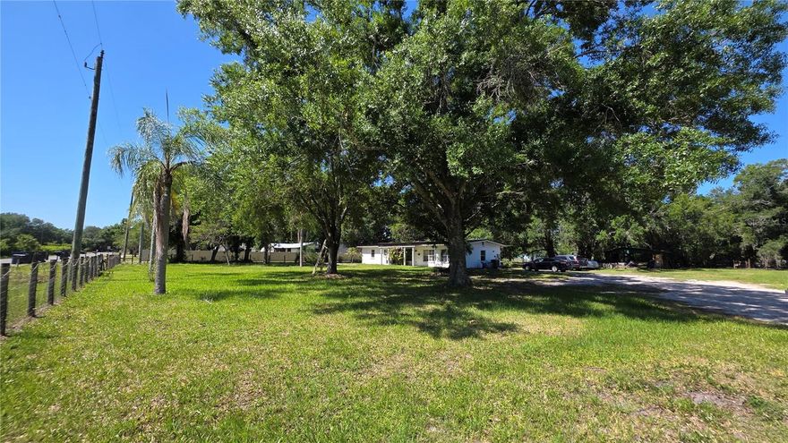 A perfect family retreat! This charming three-bedroom home sits on ONE ACRE LOT of beautiful land filled with mature oaks, palms, and lush greenery. Inside, you’ll find an open kitchen and an oversized master suite privately separated from the 2 GUEST bedrooms. The expansive yard offers endless possibilities—gardening, animals, storage, or even adding a pool.
With no flood zone, no HOA, and no restrictions, you’re free to bring your horses, chickens, RVs, boats, motorcycles, and all your toys. Enjoy quiet country living with ample space for family gatherings and outdoor fun. Schedule your private tour today.