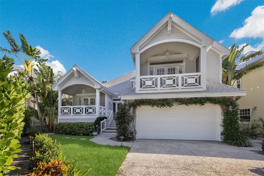 Greeted by mature landscaping and a two-car garage, this two-story residence with over 3,000+ square feet of living space is ideally positioned to overlook the State Preserve, capturing views of the lake and the Gasparilla Island Lighthouse.  Featuring 3 bedrooms, 3.5 baths with hardwood flooring, plantation shutters throughout, French doors and beadboard walls/ceiling.  The open living/dining area offers high ceilings and glass-filled rear elevation to maximize the spectacular like views.  Gathering areas include several sitting rooms and multiple screened porches. The kitchen is equipped with custom cabinetry, dual sinks and features GE and Sub-Zero appliances.  The main level also features a guest en-suite, powder, and laundry room with built-in cabinetry.  Mid-level offers the second guest en-suite with French doors to a private screened balcony. Ascending the second level to the primary suite with high ceilings offers access to a private lake side screened balcony.  Master bath is outfitted with custom built-ins, dual sinks, soaking tub, walk-in shower, water closet and two walk-in closets. The exterior features multiple composite decking spaces and is well landscaped for privacy. This property is within the gated community of Boca Bay North Village.  Amenities include the Boca Bay Pass Club, offering Gulf front dining and a recreation center with a heated pool, seven Har Tru tennis courts, fitness center and a tennis pro-shop.