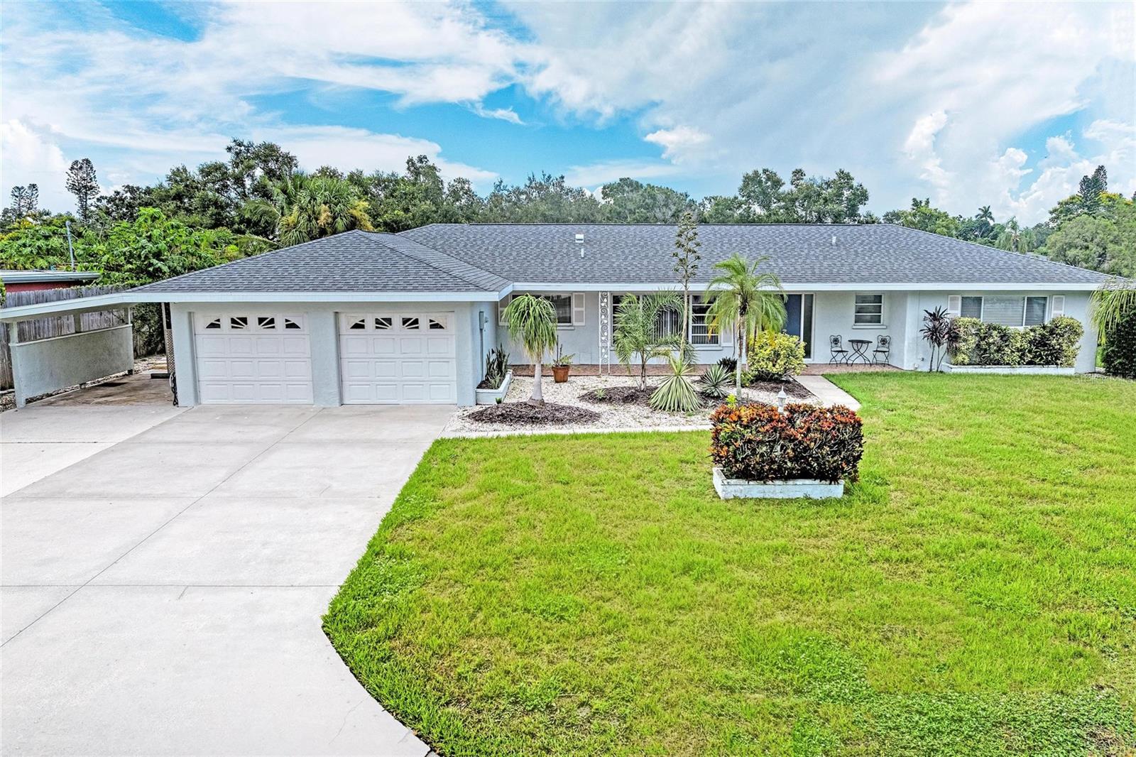 Nestled in the heart of Sarasota’s desirable South Gate community, this beautifully maintained TURNKEY mid-century home offers the perfect blend of classic style and modern comfort. Featuring a 2019 roof, a sparkling in-ground pool with brand-new pavered decking overlooking Phillippi Creek, this residence delivers Florida living at its finest. Inside, you’ll find a flexible floor plan highlighted by a secondary primary suite, ideal for multigenerational living, a private guest retreat, or potential rental income. The home’s original charm is preserved through thoughtful details while offering space and versatility for today’s lifestyle. Whether relaxing by the pool or entertaining guests, this property invites you to enjoy Sarasota’s natural beauty right from home. Located just minutes from Downtown Sarasota, Sarasota Memorial Hospital, shopping, dining, and world-renowned beaches, this home offers unbeatable convenience in a tranquil, established neighborhood. Don't miss this unique opportunity to own a piece of Sarasota’s mid-century heritage with modern potential.