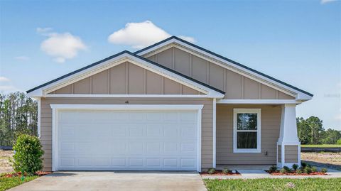Photo of 44 Mulligan Way, Bunnell, FL 32110 (MLS # FC315709)