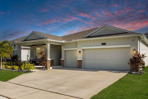 Photo of 6997 Perch Hammock Loop, Groveland, FL 34736 (MLS # O6346646)