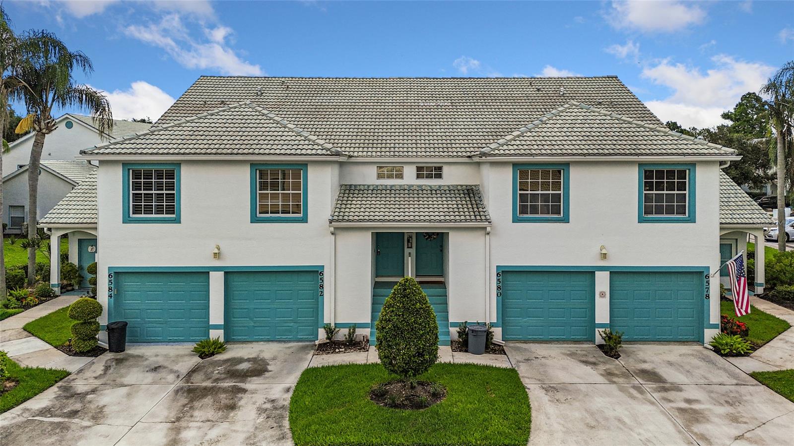 Amazing New Price Reduction! Property may qualify for a Lender/Seller Paid Mortgage Interest Rate Reduction Credit when using an approved lender- available at closing, buyer qualifications and lender guidelines and restrictions may apply* (see below)! Paradise found! Take up residence in this unique and beautiful enclave of maintenance-free luxury townhomes located in one of Manatee County's most desirable golf and country club communities known as Fairway Gardens at Tara! Only minutes to Lakewood Ranch, Bradenton, and Sarasota, with easy access to I-75 and all routes to Tampa/St Pete! Local shopping, highly rated schools, parks, ball and soccer fields, tennis, golf abound nearby! Tara Golf and Country Club features a spectacular community clubhouse and restaurant, and best of all... this highly desirable community is located only a short distance to the ultra fine sandy beaches of the Gulf of Mexico and its barrier key islands! Enjoy the best that country club living has to offer with a convenient Social "Class B" membership - includes use of clubhouse restaurant, snack bar, cardrooms, clubhouse swimming pool, fitness center, jacuzzi, steam room! No obligation for Golf or Country Club - Class A membership - but limited golf access can be available via Social Membership at a discounted fee basis, only if desired! Spectacular Florida/Key West style unit with 2 bedroom/2 bath open floor plan and elements of casual luxury everywhere you turn! Light, bright and airy... this upscale unit boasts cathedral/vaulted ceilings, large master bedroom with ensuite bathroom to the rear, walk-in closet, newly remodeled/updated kitchen and bathrooms - island kitchen with breakfast nook, granite counter tops and island, and stainless steel appliances, brand new wood luxury vinyl plank floors in main living area, large open dining/living room, split plan with secondary guest bedroom and bathroom to the front, screened balcony lanai with built in blinds overlooking a large green space and community pool, and to top it all off... an attached 1 car garage on the lower level with adjacent guest parking spots! Gorgeous ceramic floors in wet areas... carpet in the bedrooms! Newly installed AC in June 2022. Lanai has also been completed enclosed with windows and horizontal blinds to keep it cool in the sun! Picturesque golf community with its club house beautifully updated and complete with heated pool/spa, exercise room/fitness center, club and social room, tennis, restaurant and so much more! *Financing incentive may be available for primary residence purchases with buyer and lender qualifications/restrictions. Financing incentive subject to lender loan approval & may change without notice. Not a commitment to lend. Additional restrictions may apply. Let's talk! Buy this one now or someone else will! Start enjoying the amazing amenities and social life at Tara in Bradenton, FL today! (some photos may be virtually staged)
