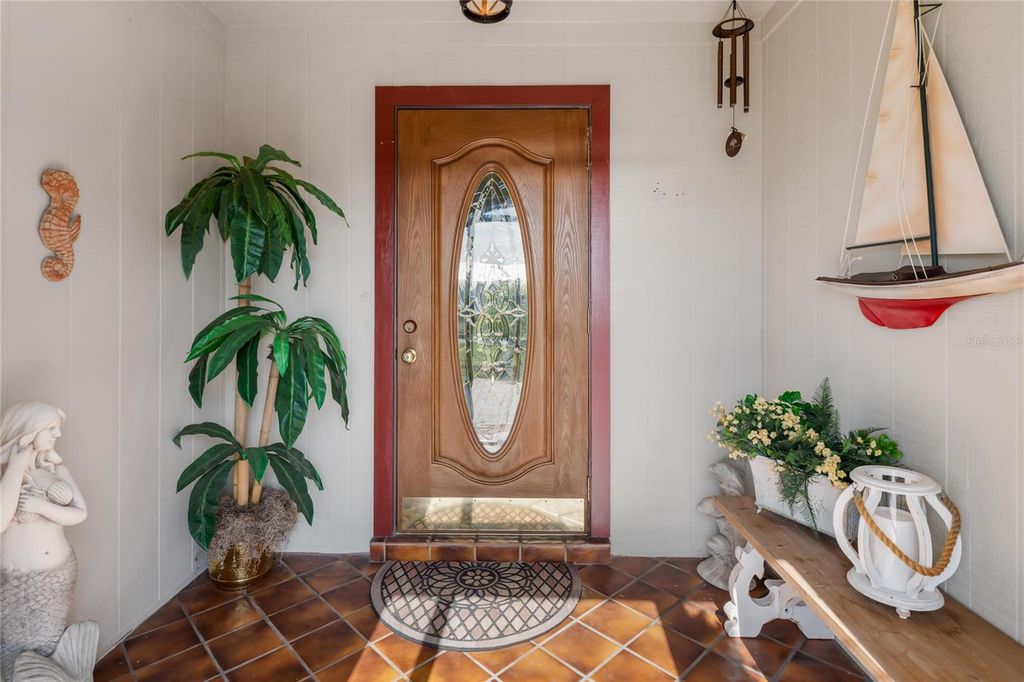 Photo of 774 Spring Lake Boulevard NW, Port Charlotte, FL 33952 (MLS # C7521180)