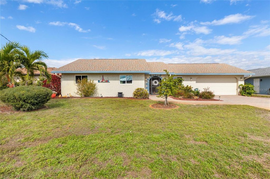 Photo of 774 Spring Lake Boulevard NW, Port Charlotte, FL 33952 (MLS # C7521180)