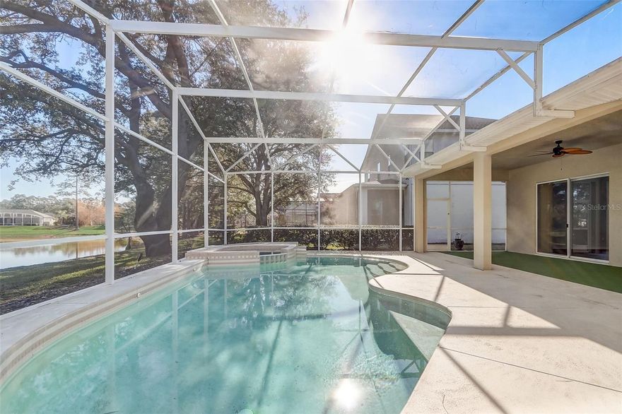 Best Value and Move-In Ready Pool Home in Lake Mary! Top-Rated Schools + Water View + 3 car garage. Discover the perfect blend of elegance and the quintessential Florida lifestyle in this stunning one level home, located in the highly sought-after Manderley community of Lake Mary. This spacious 4-bedroom, 3-bathroom residence offers over 2,200 sq. ft. of beautifully designed living space, featuring an open-concept, split-bedroom floor plan with no carpet. Step inside to soaring ceilings, an abundance of natural light, and a seamless flow of brand-new vinyl flooring and tile. The spacious chef-style kitchen is a standout with granite countertops and stainless steel appliances, overlooking an inviting family room that leads directly to your private outdoor oasis. Relax on the expansive screened-in patio or take a dip in the sparkling pool while enjoying tranquil, unobstructed water views. Situated in a top-rated school district, this home is just minutes from premier shopping, dining, the Crossings biking/walking trails, and leading healthcare facilities, with easy access to I-4 and 417. This exceptional value won't last—schedule your showing today!