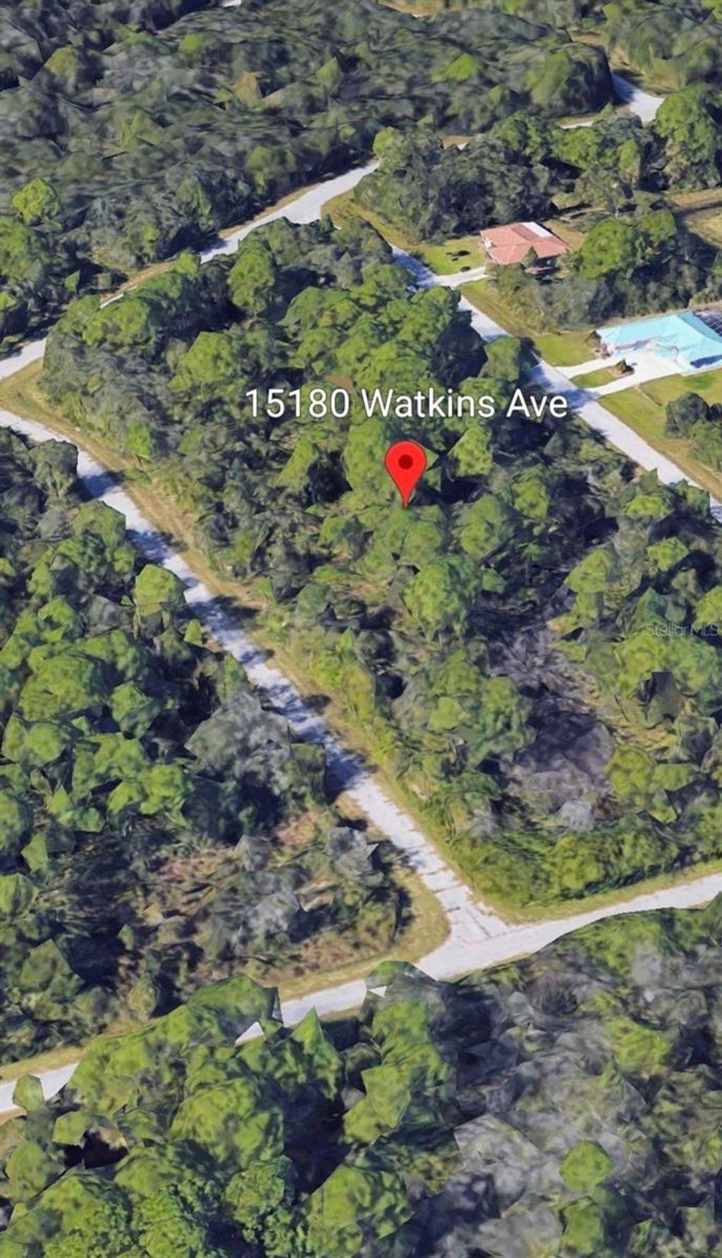 Photo of 15180 Watkins Avenue, Port Charlotte, FL 33953 (MLS # OM711291)