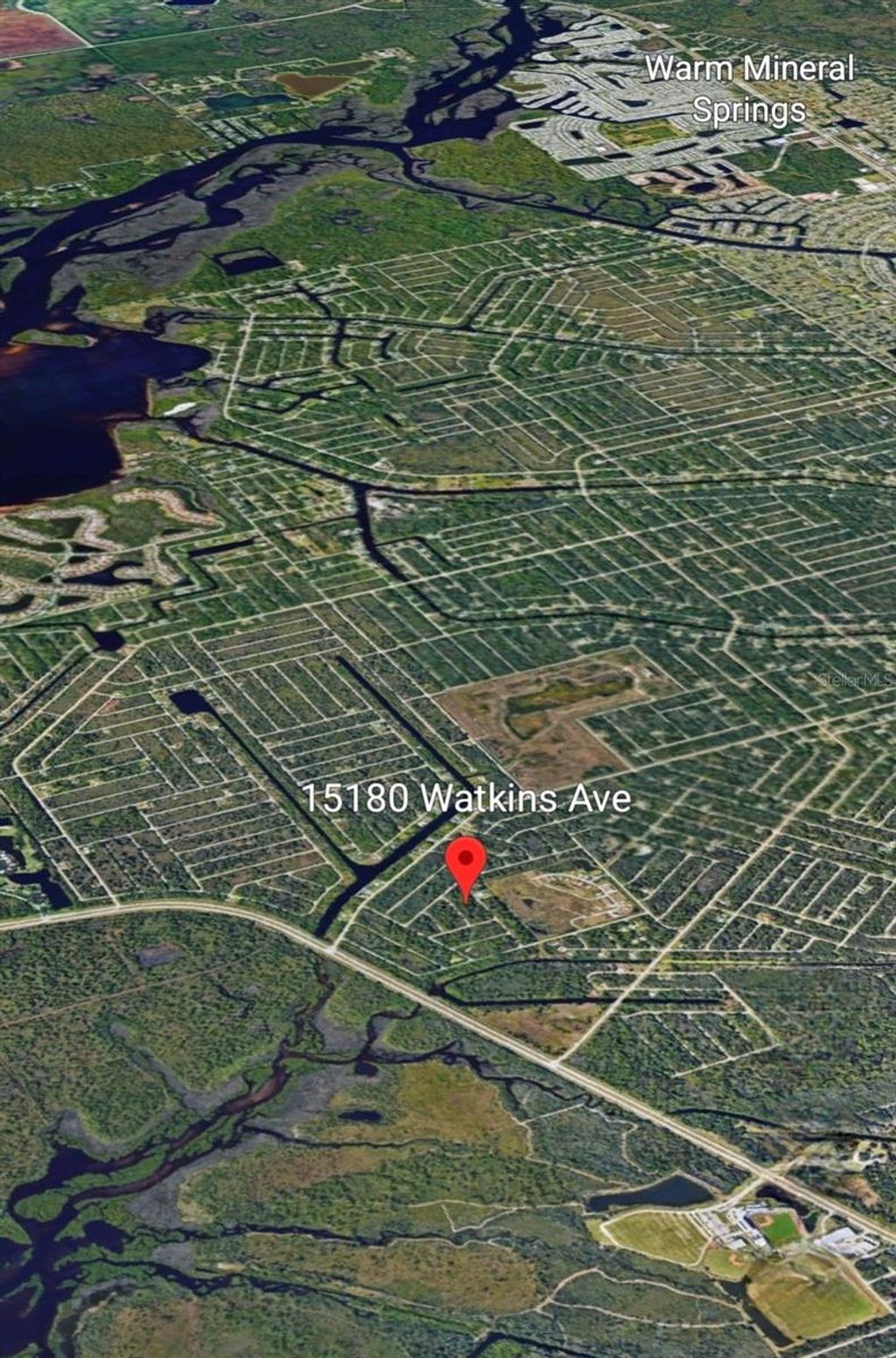 Photo of 15180 Watkins Avenue, Port Charlotte, FL 33953 (MLS # OM711291)