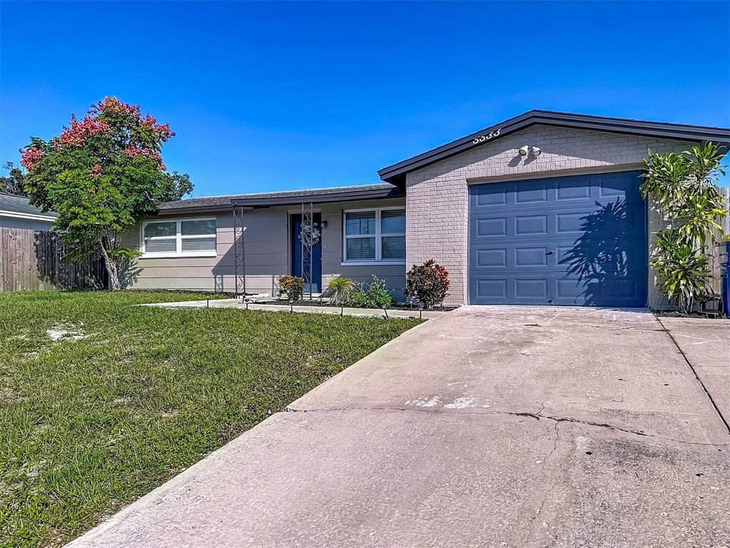 Photo of 5533 Riddle Road, Holiday, FL 34690 (MLS # TB8441119)