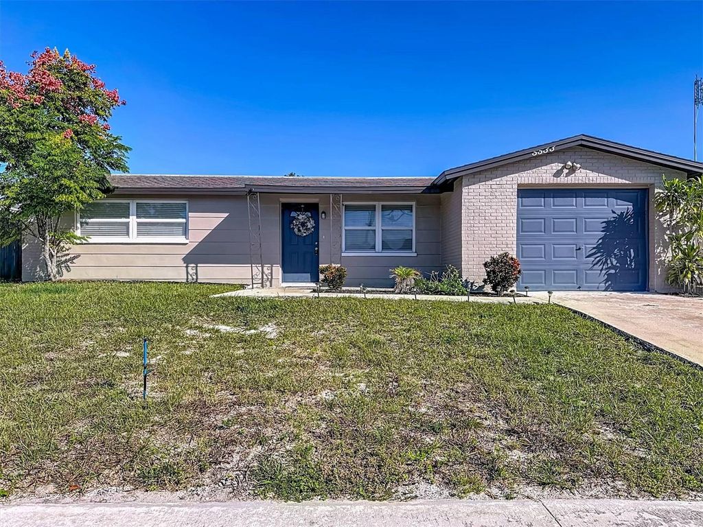 Photo of 5533 Riddle Road, Holiday, FL 34690 (MLS # TB8441119)
