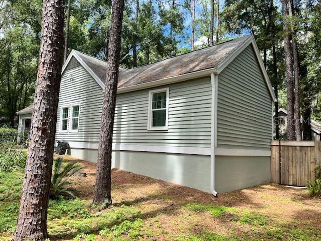 Photo of 4921 SW 83rd Terrace, Gainesville, FL 32608 (MLS # GC537549)