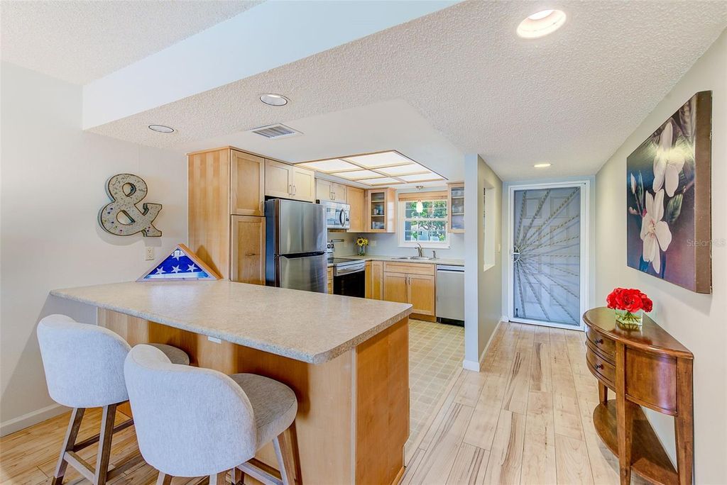 Photo of 12900 Vonn Road #E205, Largo, FL 33774 (MLS # TB8416293)