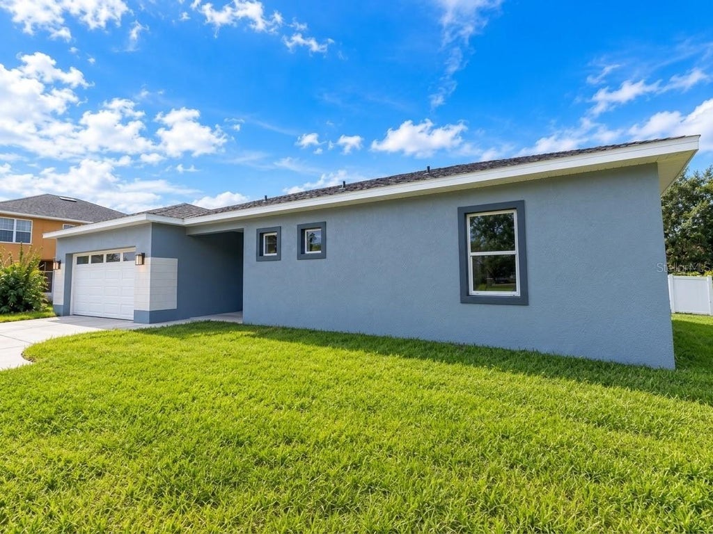Photo of 506 Bristol Circle, Kissimmee, FL 34758 (MLS # O6452719)