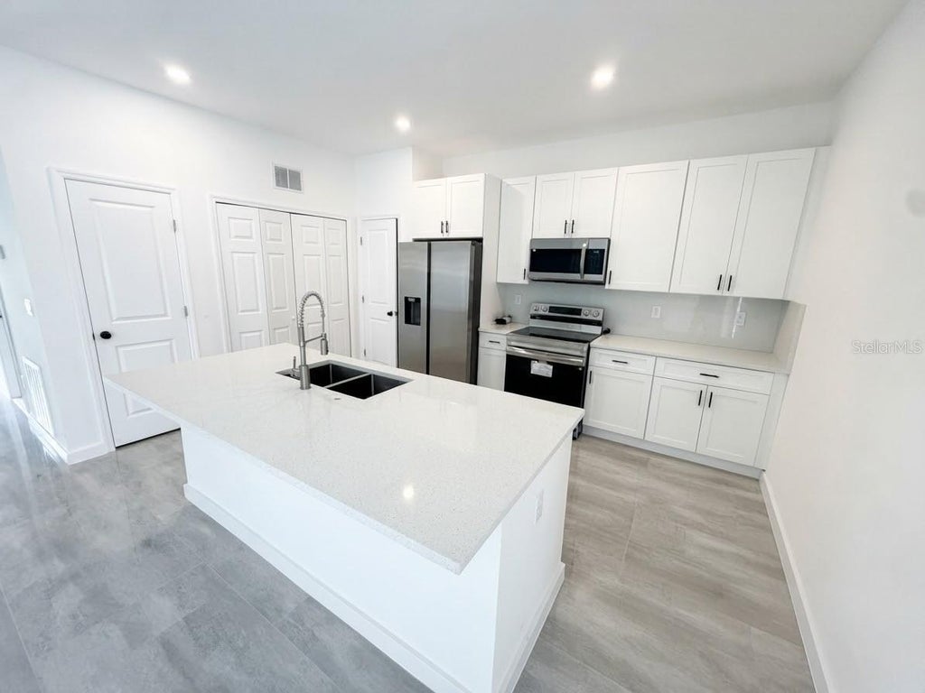Photo of 506 Bristol Circle, Kissimmee, FL 34758 (MLS # O6452719)