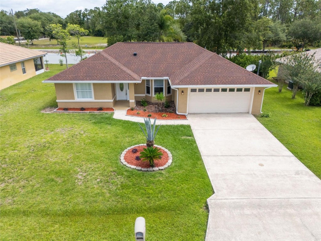 Photo of 37 Rockefeller Drive, Palm Coast, FL 32164 (MLS # FC319272)