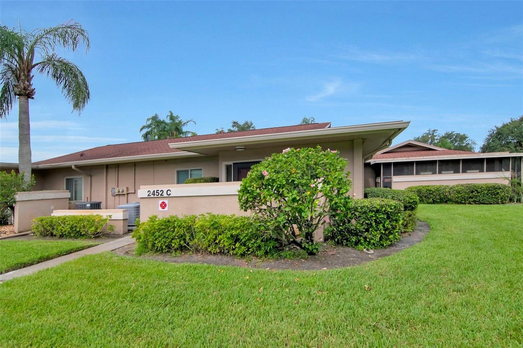 Photo of 2452 Laurelwood Drive #C, Clearwater, FL 33763 (MLS # TB8549393)