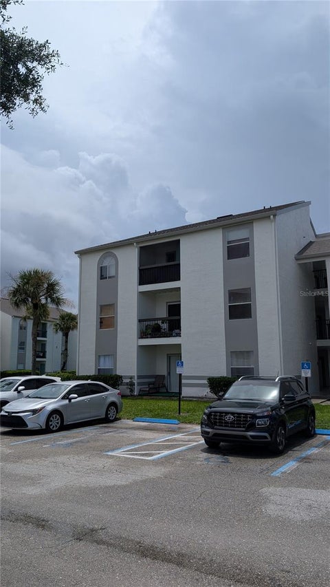 Photo of 5271 Images Circle #202, Kissimmee, FL 34746 (MLS # O6452111)