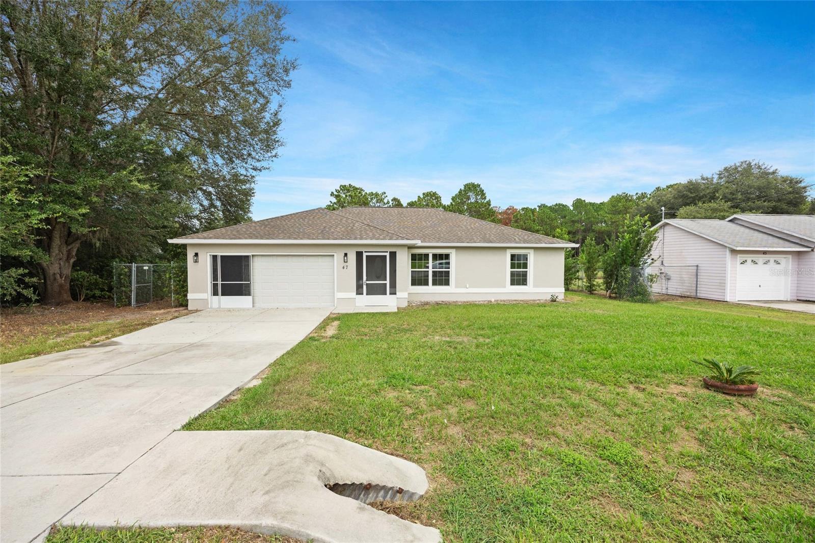 Welcome to this charming home located at 47 Pine Circle in the Silver Springs Shores subdivision of Ocala! This move-in ready gem boasts brand-new appliances, a bright open layout, and comfortable living spaces. Nestled just minutes from shopping, dining, schools, parks, and medical offices, you’ll enjoy both convenience and comfort. With a spacious yard and a peaceful setting, this home is ready to welcome its next owner.