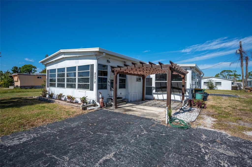 Photo of 2070 Essence Avenue, Englewood, FL 34224 (MLS # D6144568)