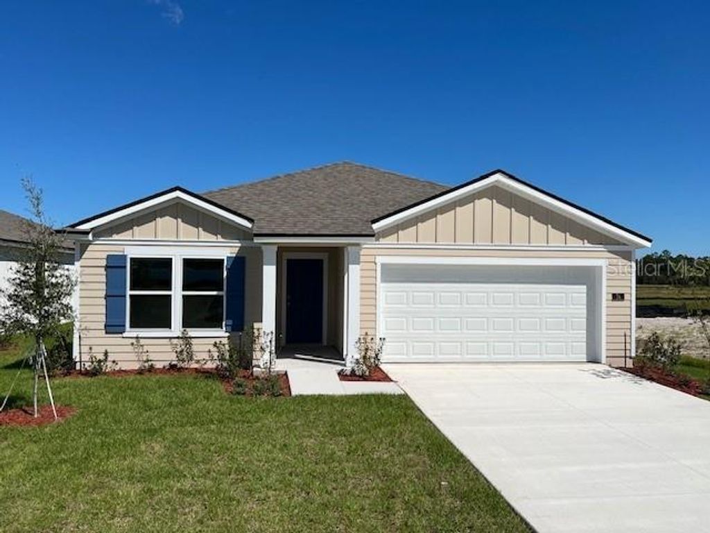 Photo of 74 Sawdust Lane, Palm Coast, FL 32137 (MLS # FC312232)