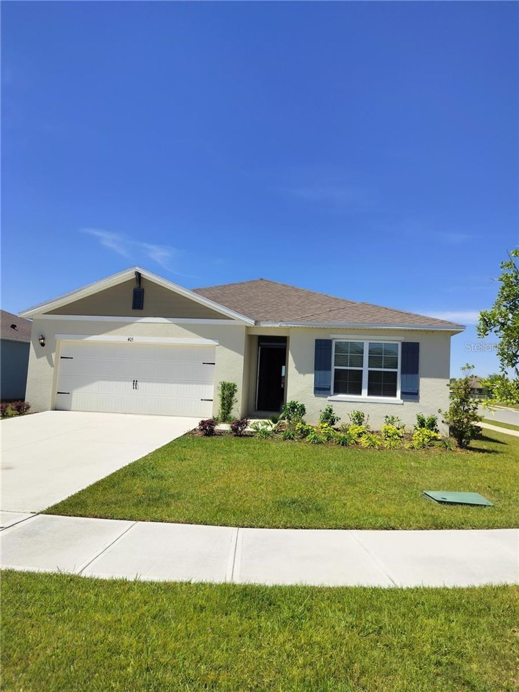 Photo of 405 Noble Avenue, Davenport, FL 33837 (MLS # S5148544)
