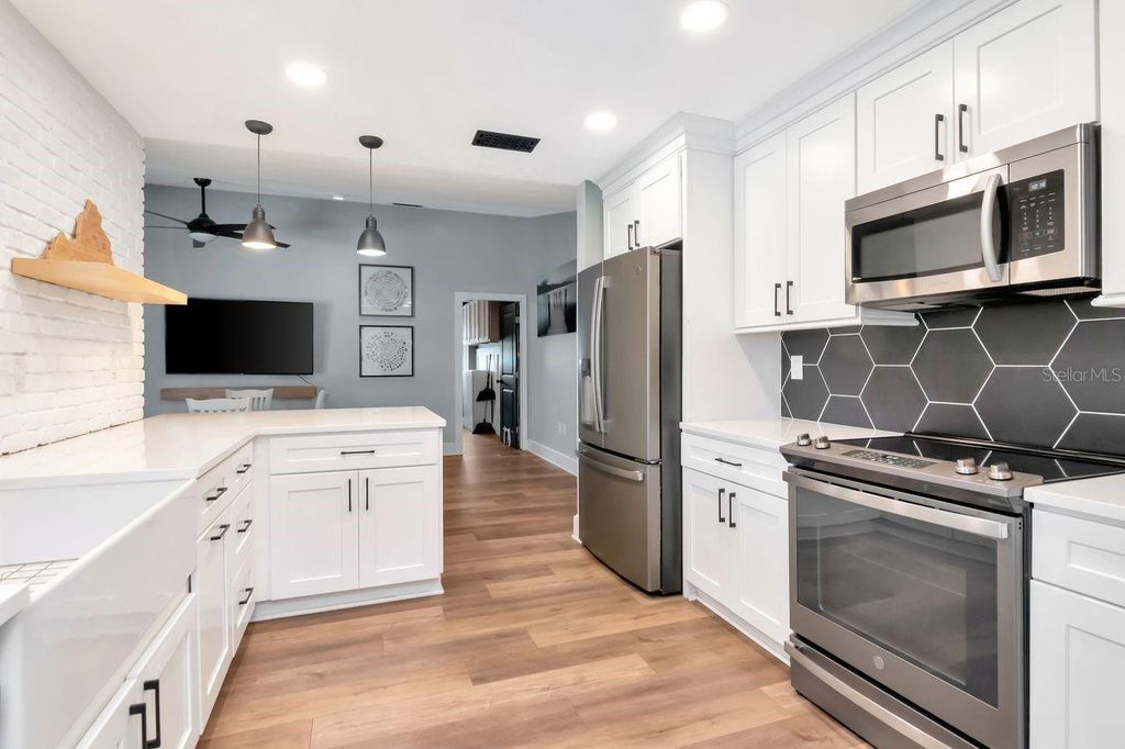 Photo of 720 Hickory Lane, Palm Harbor, FL 34683 (MLS # TB8479261)