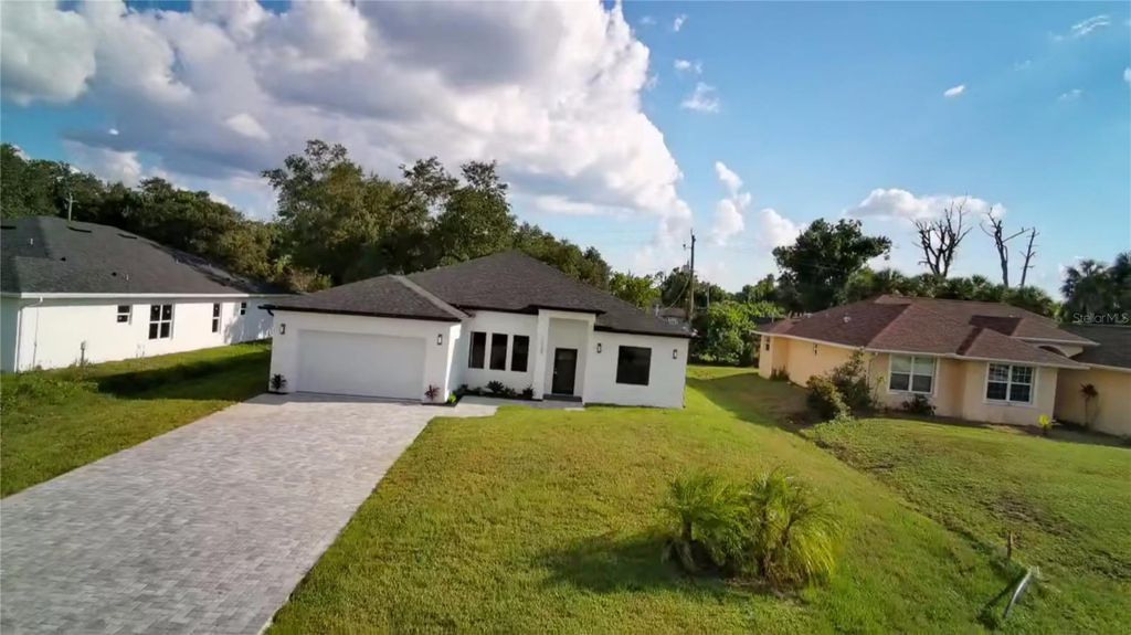 Photo of 17049 Hillsborough Boulevard, Port Charlotte, FL 33954 (MLS # TB8430038)