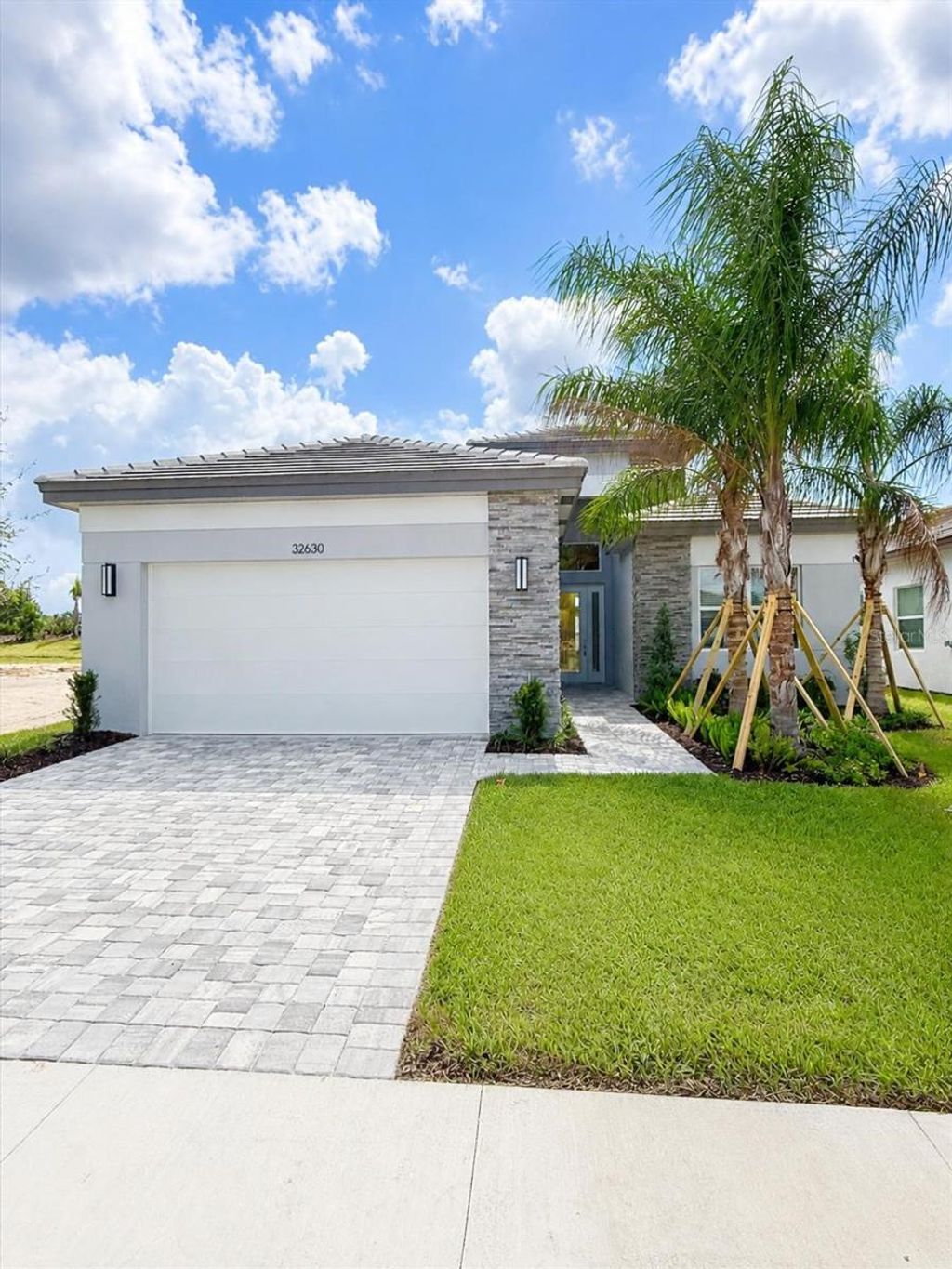 Photo of 32630 Neroli Street, Wesley Chapel, FL 33543 (MLS # TB8523374)