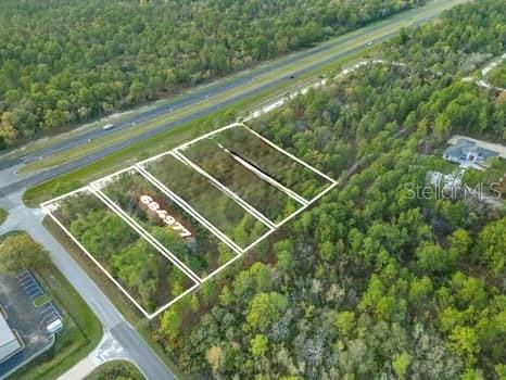 Prime C-2 commercial lot located in the rapidly growing Hernando County Nature Coast. This 0.48-acre parcel measures 77 x 275 feet and sits on Nicasio Jay Avenue, a service road running parallel to US Hwy 19/Commercial Way, offering excellent visibility and accessibility. Zoned C-2 General Commercial, this lot allows for a wide variety of uses, including retail, office, restaurants, and more. It is conveniently located near the entrance of the Seville Subdivision, The Dunes Golf Club, Weeki Wachee Springs, shopping centers, schools, medical facilities, and the Suncoast Parkway. The lot can be purchased individually or together with the adjoining parcel for expanded development potential. Hernando County is experiencing rapid growth, and property values continue to rise making this a strategic opportunity for new businesses, relocations, or expansions. The neighboring lot is also available. Let’s make a deal, don’t miss out! Additional parcel for sale TB8393157