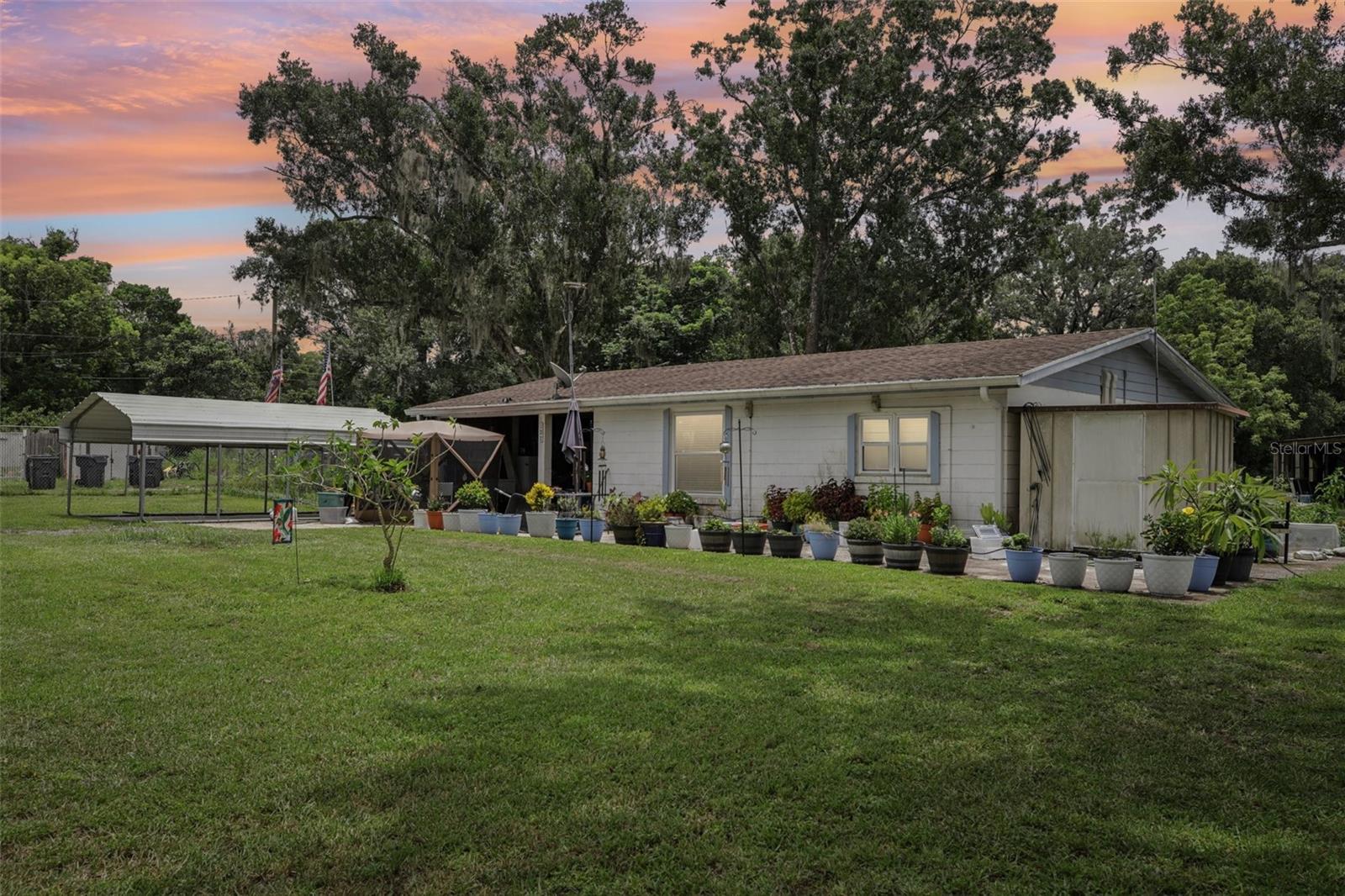 Looking for space, freedom, and a great central Florida location? This charming block home in Davenport sits on an oversized 0.64-acre lot with no HOA, giving you the flexibility to live your way—bring your boat, RV, or start your next big project! Inside, you’ll find a comfortable layout featuring two bedrooms, living room, and a kitchen that opens seamlessly to the dining area. The home has been updated with brand-new mini split systems in 2024, hurricane-rated windows installed in 2023, a 2025 refrigerator, and new ceiling fans throughout. Step outside to enjoy multiple storage sheds—including a brand-new one in 2024—and plenty of parking with a carport and an additional parking pad. The seller is even leaving an Ego lawn mower to help you keep that huge yard looking sharp! Located in Davenport, you’ll love the easy access to Orlando’s world-famous attractions, Lakeland’s charm, and Tampa’s endless entertainment, all just a drive away. Don’t miss your chance to own a slice of Florida with room to grow—schedule your showing today!