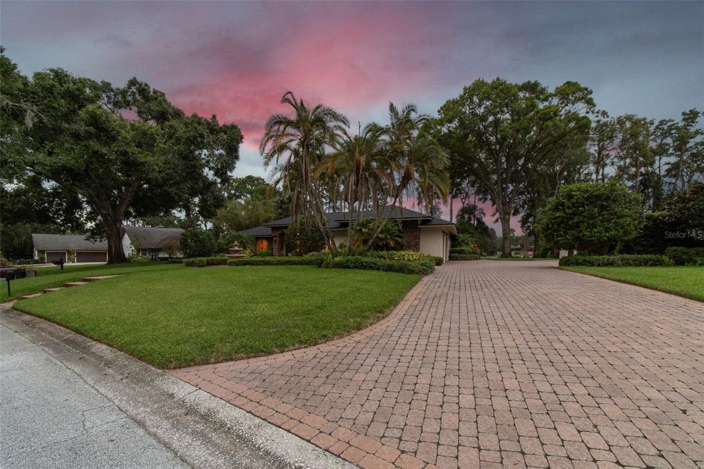 Photo of 1004 Ballinger Road, Lutz, FL 33548 (MLS # TB8407410)