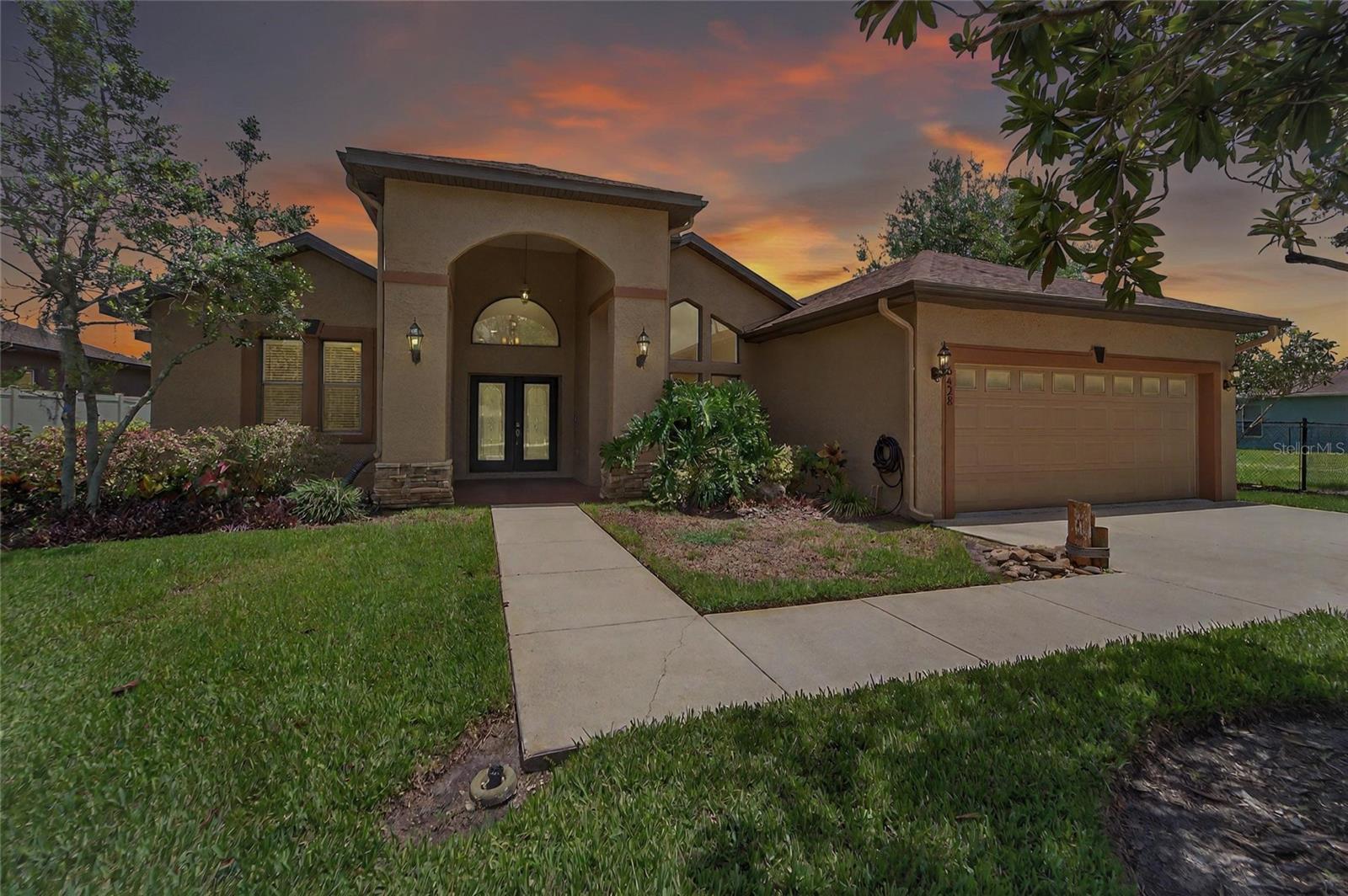 Welcome to Your Lakefront Paradise!
This custom-built 4-bedroom, 2-bath, 2-car garage home sits on a meticulously maintained nearly half-acre lot with spring-fed, private SKI lake access. There is a fire pit, Trex dock, jet ski floating dock, and your very own sandy beach—perfect for fishing, kayaking, relaxing, or enjoying water sports.
Inside, you’ll find 12-foot ceilings, a wood-burning fireplace, brand new LVP flooring, fresh interior paint, new 5-inch baseboards, updated electrical outlets, door fixtures and a new 2024 roof. The spacious layout is filled with natural light and offers stunning lake views from the moment you walk through the beautiful double-door entry. The property includes a 120 square-foot shed providing plenty of storage for all your outdoor gear.
The community features a boat launch and dock at the adjacent lot-offering added space and convenience.
Plus, this property is in a no flood zone and has no CDD fees, giving you year-round peace of mind.
This move-in ready lakefront gem blends comfort, style, and outdoor living. Don’t miss this rare opportunity!