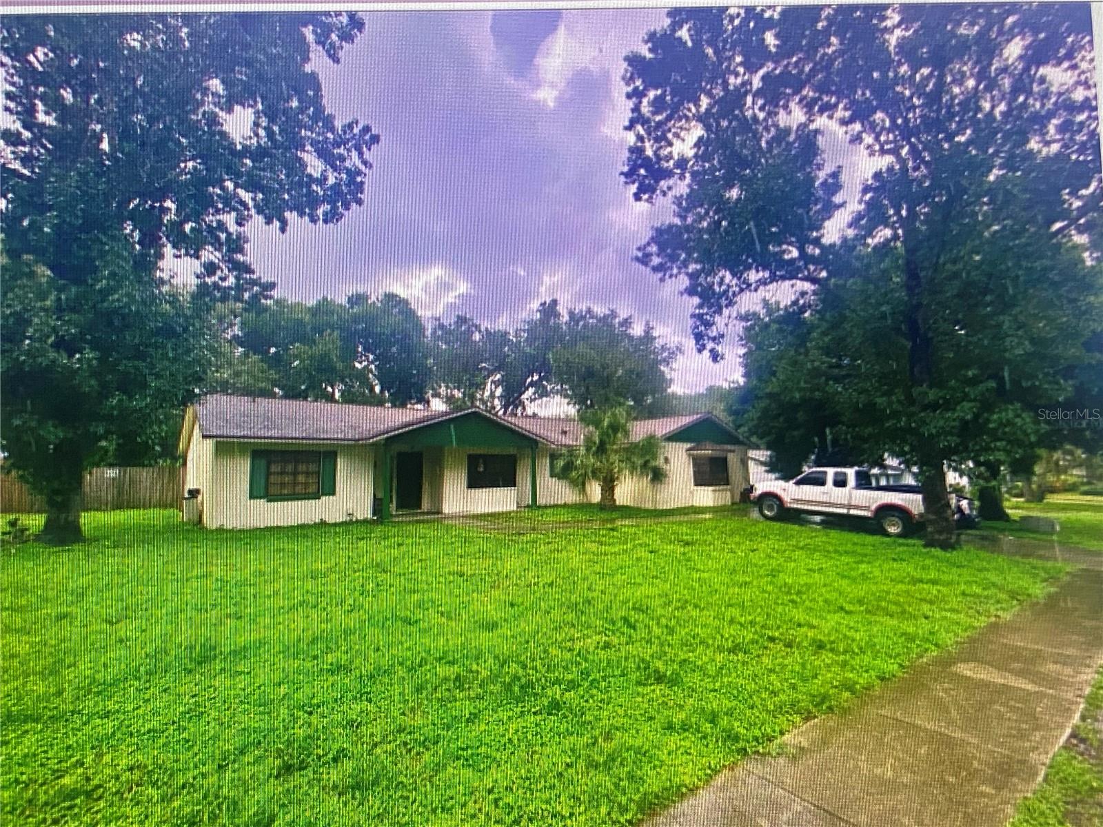 4 Bed 2 Bath - Great Location & nice neighborhood! Nice lot! Just over .25 of an acre. No HOA. Seller has recently replaced the entire roof in 2023 and painted exterior of home. The living room is very open which allows for a lot of natural sunlight and is perfect for entertaining with its open floor concept! The kitchen is open and has lots cabinets. Master bedroom is generously sized with a large bathroom. The additional bedrooms are also nicely sized.. This property features a spacious backyard with a screened balcony. This home is situated on .26 of an acre. Located near I-4, 417, Sun Rail, Sanford Airport, Seminole Towne Center. 20 Minutes to Downtown Orlando. Schedule your showing today